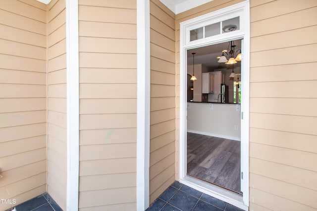 10119 Glen Autumn Rd, Raleigh, NC 27617 - view of exterior entry with a sink
