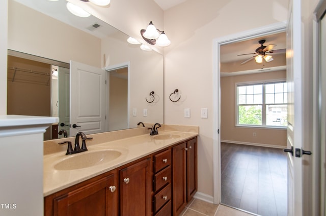 10119 Glen Autumn Rd, Raleigh, NC 27617 - bathroom with double vanity and ceiling fan