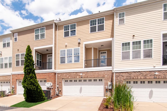 10119 Glen Autumn Rd, Raleigh, NC 27617 - view of front of house featuring brick siding, driveway, and an attached garage