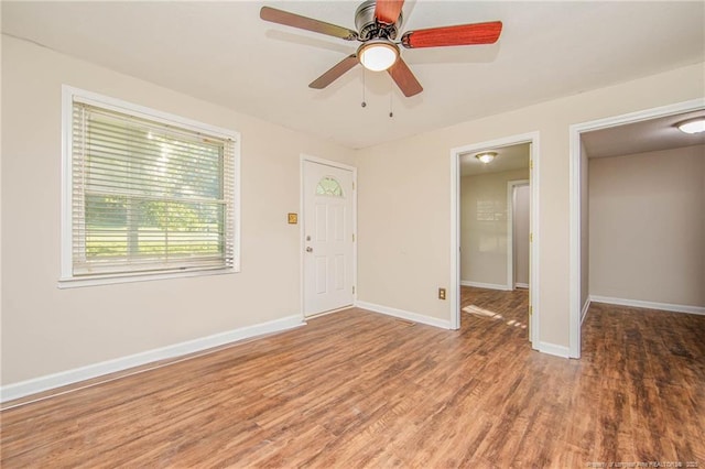 3211 Blossom Rd, Fayetteville, NC 28306 - foyer with wood finished floors and a ceiling fan
