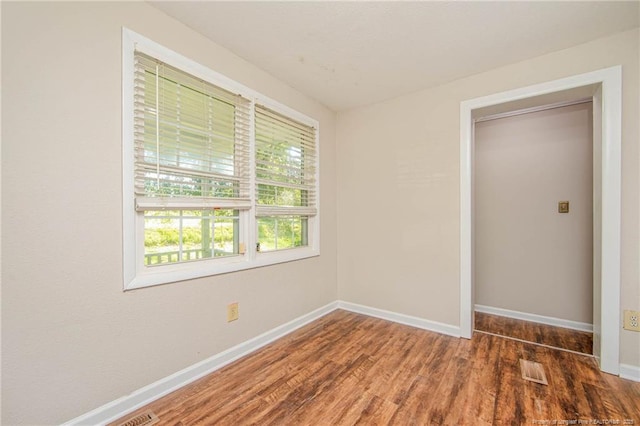3211 Blossom Rd, Fayetteville, NC 28306 - unfurnished room featuring baseboards and wood finished floors