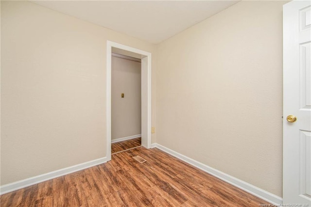 3211 Blossom Rd, Fayetteville, NC 28306 - empty room with wood finished floors and baseboards