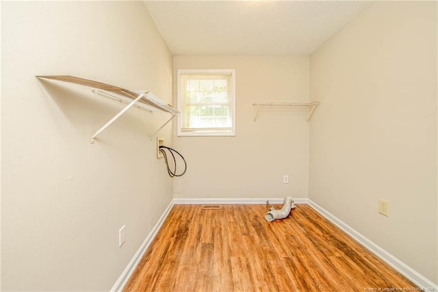 3211 Blossom Rd, Fayetteville, NC 28306 - laundry area with washer hookup and wood finished floors