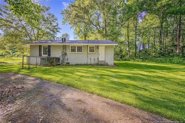 3211 Blossom Rd, Fayetteville, NC 28306 - view of front of house with a front yard
