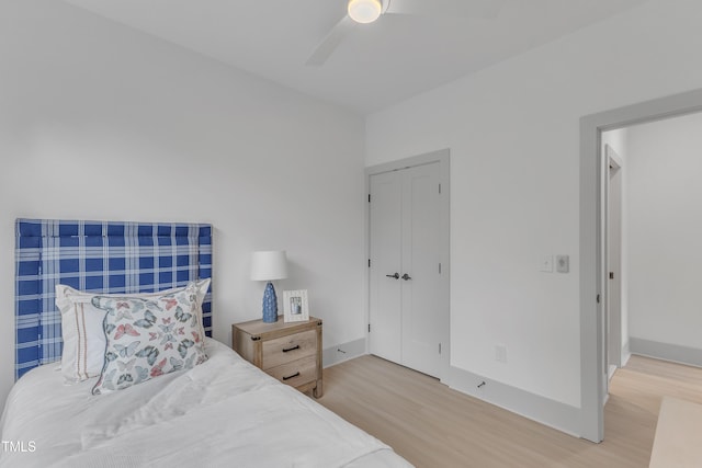 1000 Addison Pl Unit 101, Raleigh, NC 27610 - bedroom with light wood finished floors, a closet, and ceiling fan