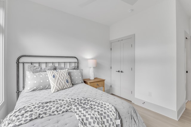 1000 Addison Pl Unit 101, Raleigh, NC 27610 - bedroom with wood finished floors and a closet