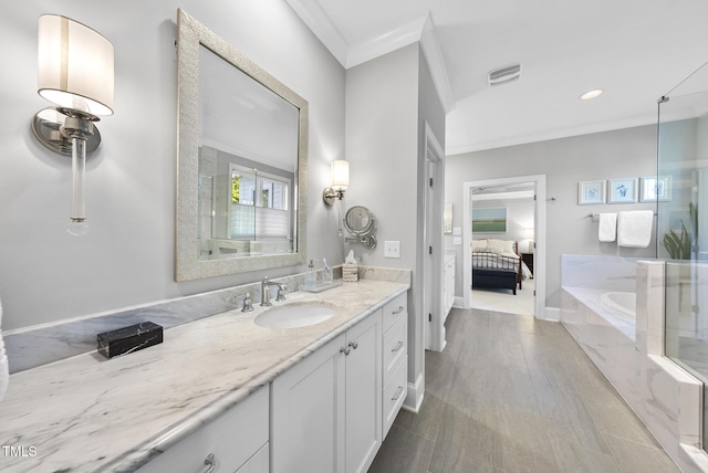 2153 Princeville Dr, Apex, NC 27523 - ensuite bathroom featuring crown molding, vanity, a garden tub, wood finished floors, and an enclosed shower