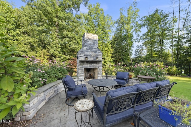 2153 Princeville Dr, Apex, NC 27523 - view of patio featuring an outdoor living space with a fireplace