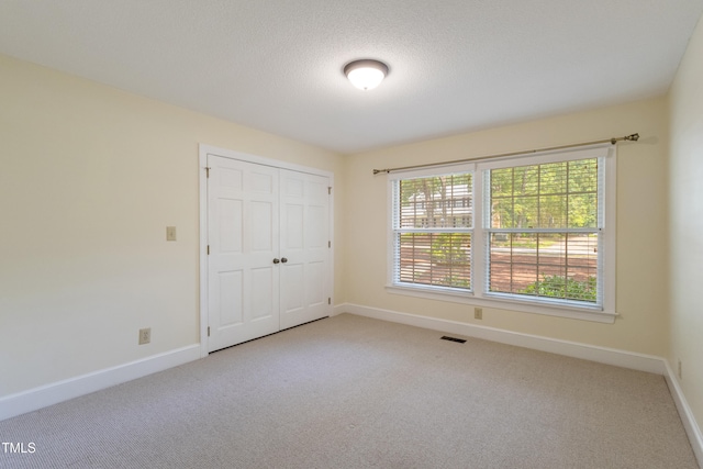 4009 Pepperton Dr, Raleigh, NC 27606 - unfurnished bedroom with carpet flooring and a closet