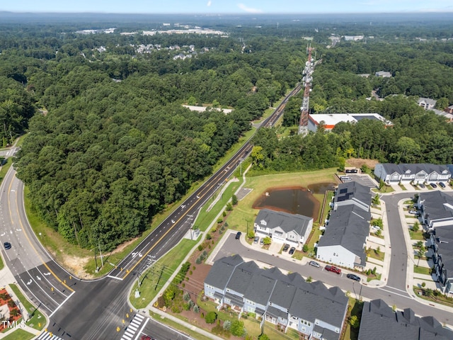 1315 Canary Pepper Dr Unit 28, Durham, NC 27713 - view of property location featuring a forest and nearby suburban area