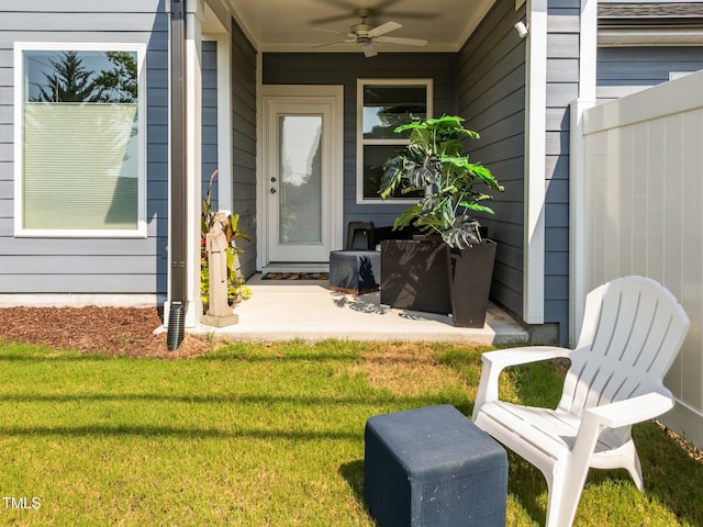 1315 Canary Pepper Dr Unit 28, Durham, NC 27713 - view of exterior entry featuring ceiling fan and a yard
