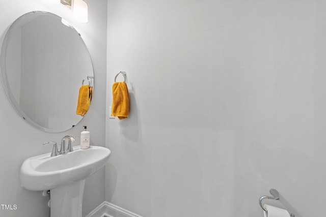 1315 Canary Pepper Dr Unit 28, Durham, NC 27713 - bathroom with a sink and baseboards