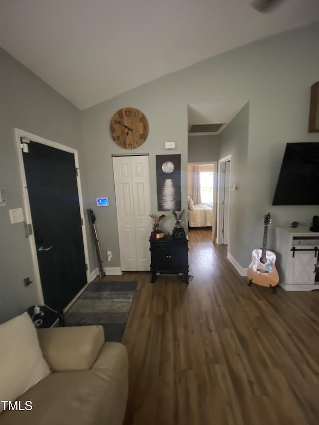30 Bethany Ln, Youngsville, NC 27596 - living room featuring wood finished floors and vaulted ceiling