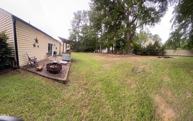 30 Bethany Ln, Youngsville, NC 27596 - view of yard featuring an outdoor fire pit