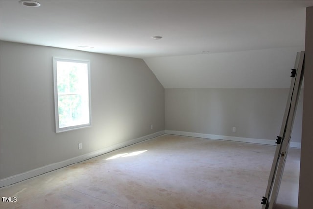 3501 Wesley Point Dr, Browns Summit, NC 27214 - bonus room featuring lofted ceiling and baseboards