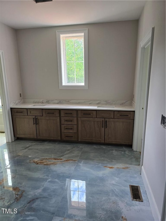 3501 Wesley Point Dr, Browns Summit, NC 27214 - kitchen featuring light countertops and a sink