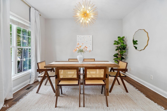 2800 Becketts Ridge Dr, Hillsborough, NC 27278 - dining area with a chandelier and wood finished floors
