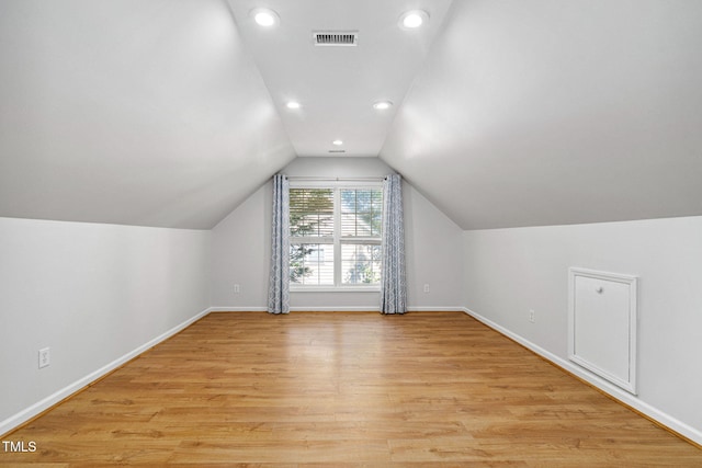 2800 Becketts Ridge Dr, Hillsborough, NC 27278 - additional living space with light wood finished floors, vaulted ceiling, and recessed lighting
