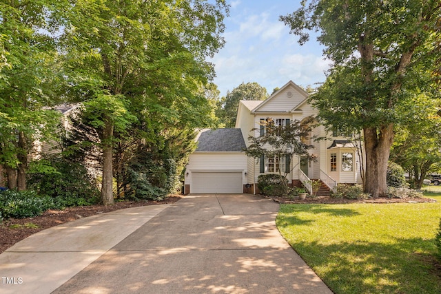 2800 Becketts Ridge Dr, Hillsborough, NC 27278 - view of front of house with an attached garage, driveway, a front lawn, and a shingled roof