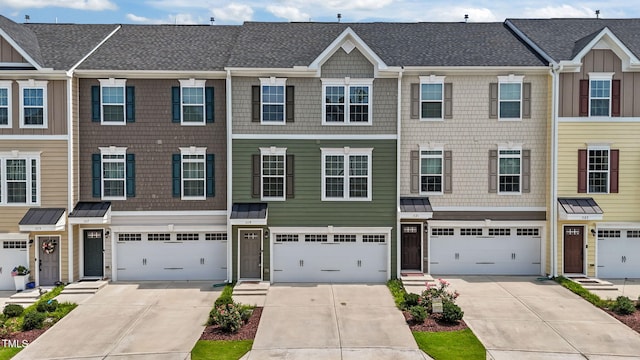 1119 Platform Dr, Apex, NC 27502 - view of property with driveway, a garage, and roof with shingles
