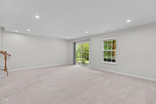 1119 Platform Dr, Apex, NC 27502 - unfurnished room with light carpet, recessed lighting, and stairs