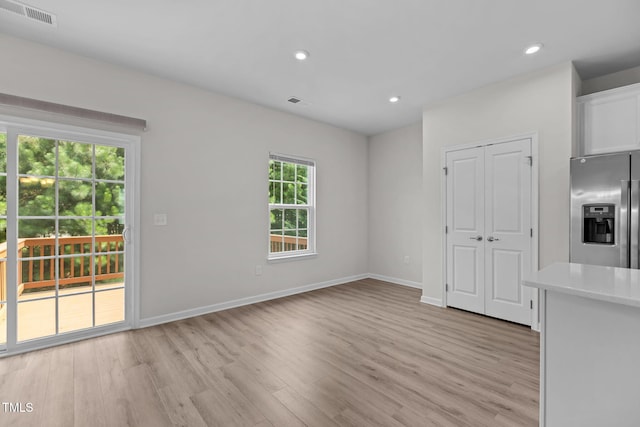 1119 Platform Dr, Apex, NC 27502 - unfurnished dining area with light wood-type flooring and recessed lighting