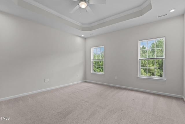 1119 Platform Dr, Apex, NC 27502 - empty room with crown molding, carpet, a raised ceiling, a ceiling fan, and recessed lighting