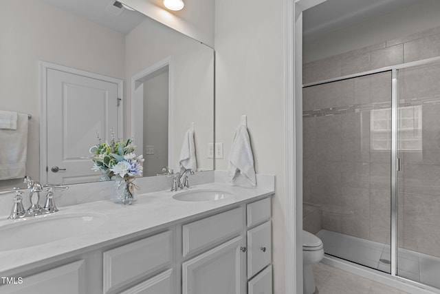 1119 Platform Dr, Apex, NC 27502 - full bath with double vanity, tile patterned floors, and a stall shower