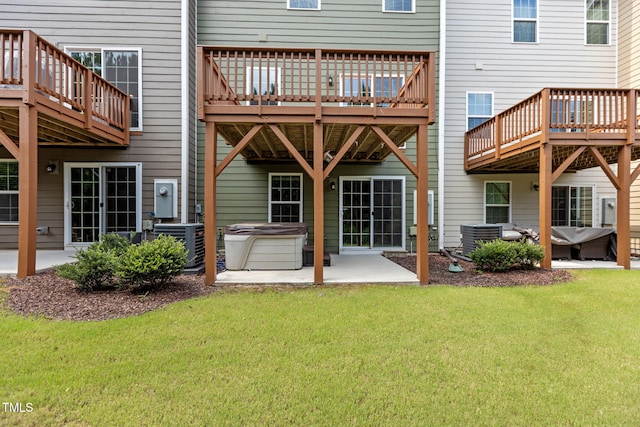 1119 Platform Dr, Apex, NC 27502 - rear view of property featuring a patio area, a lawn, a deck, and an outdoor hangout area