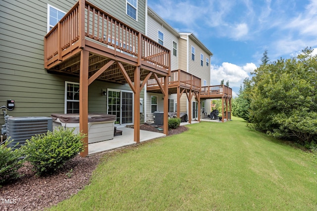 1119 Platform Dr, Apex, NC 27502 - back of house with a patio, a yard, a wooden deck, and a hot tub
