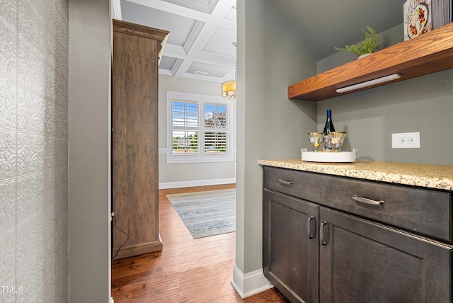 3313 Bentwinds Bluffs Ln, Fuquay Varina, NC 27526 - bar area featuring coffered ceiling, light wood-style flooring, and beamed ceiling