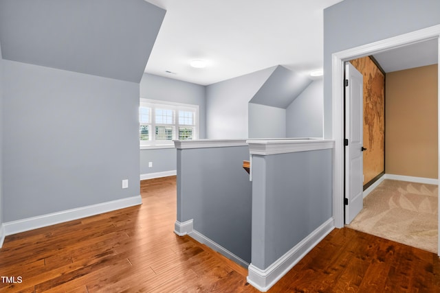 3313 Bentwinds Bluffs Ln, Fuquay Varina, NC 27526 - hall with an upstairs landing and wood finished floors