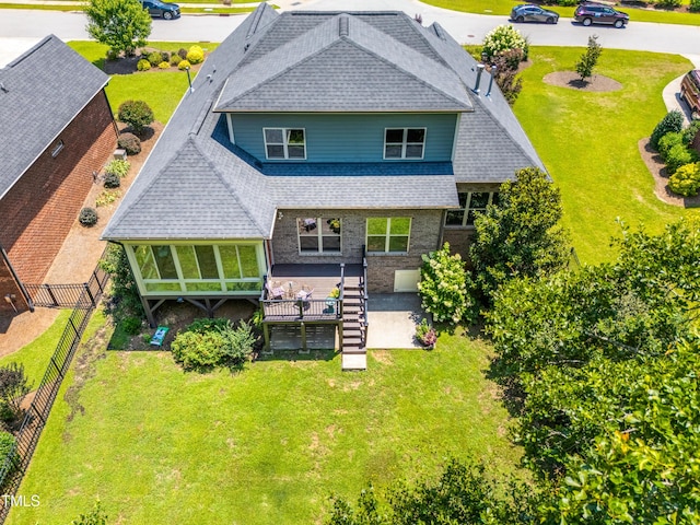 3313 Bentwinds Bluffs Ln, Fuquay Varina, NC 27526 - back of property with a shingled roof, stairs, and a fenced backyard