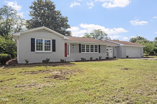 946 Jacksontown Rd, Henderson, NC 27537 - ranch-style house featuring brick siding, an attached garage, a front lawn, and french doors