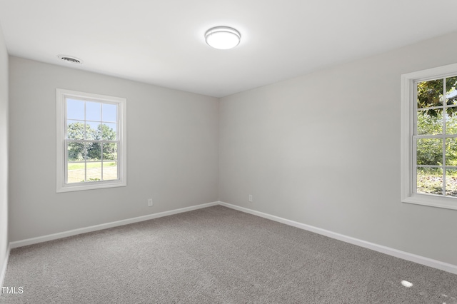 946 Jacksontown Rd, Henderson, NC 27537 - carpeted empty room with baseboards
