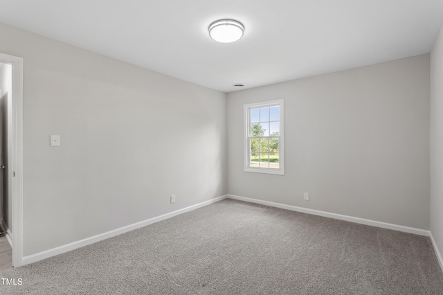946 Jacksontown Rd, Henderson, NC 27537 - carpeted spare room featuring baseboards
