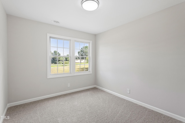 946 Jacksontown Rd, Henderson, NC 27537 - carpeted empty room featuring baseboards