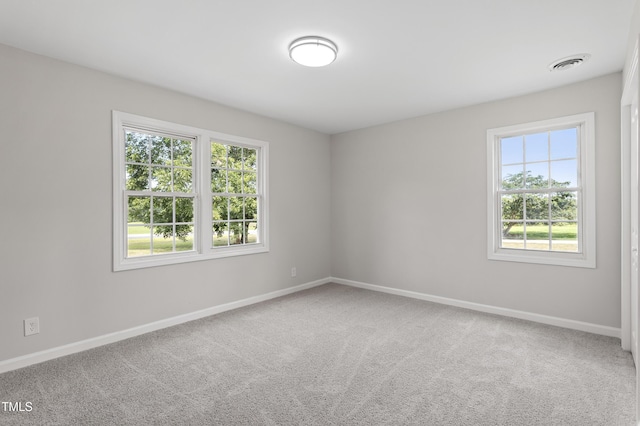 946 Jacksontown Rd, Henderson, NC 27537 - carpeted spare room with healthy amount of natural light