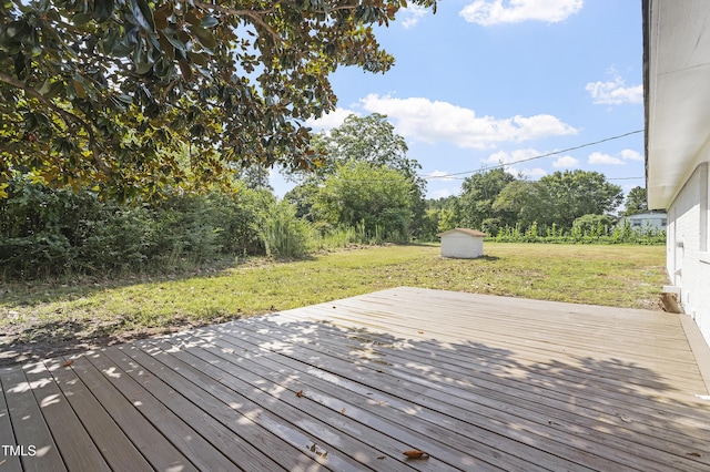 946 Jacksontown Rd, Henderson, NC 27537 - deck featuring a yard and a storage shed