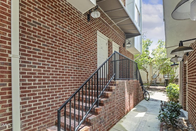 400 W Rosemary St Unit 102, Chapel Hill, NC 27516 - doorway to property with brick siding
