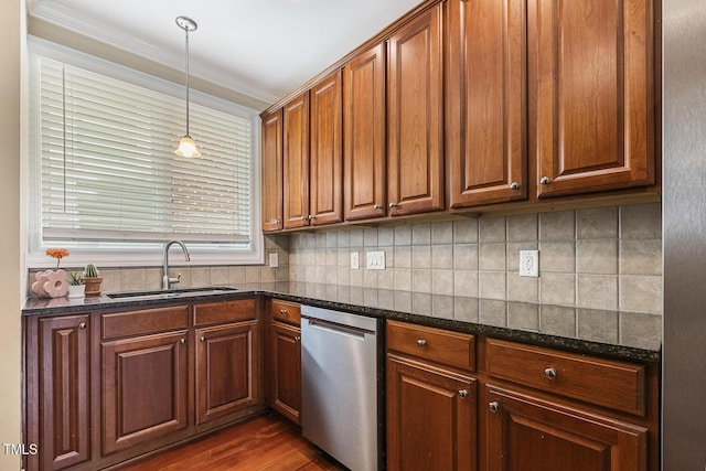 400 W Rosemary St Unit 102, Chapel Hill, NC 27516 - kitchen featuring stainless steel dishwasher, dark stone counters, backsplash, hanging light fixtures, and dark wood-style floors