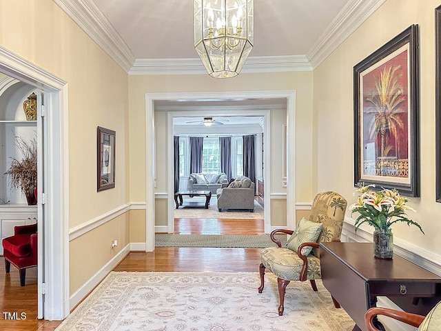 141 Country Club Dr, Henderson, NC 27536 - hall featuring wood finished floors, a chandelier, and ornamental molding