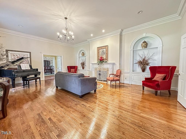 141 Country Club Dr, Henderson, NC 27536 - living area featuring a chandelier, ornamental molding, light wood-style floors, and recessed lighting