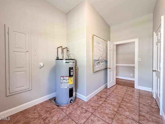 141 Country Club Dr, Henderson, NC 27536 - utility room featuring water heater