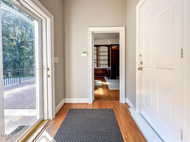 141 Country Club Dr, Henderson, NC 27536 - entrance foyer with light wood-style floors and crown molding