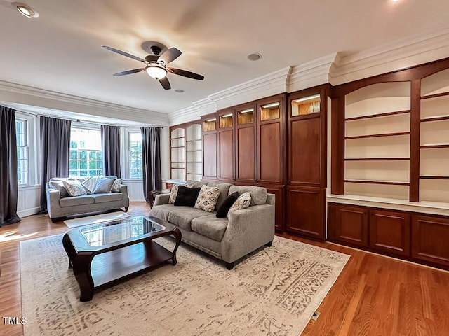 141 Country Club Dr, Henderson, NC 27536 - living room featuring crown molding, a ceiling fan, wood finished floors, built in shelves, and recessed lighting