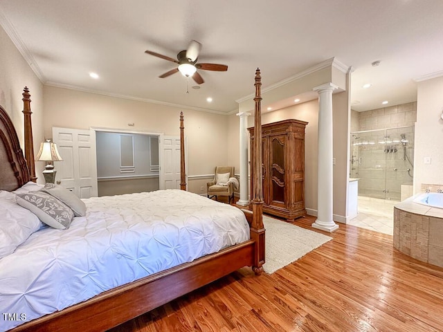 141 Country Club Dr, Henderson, NC 27536 - bedroom with ornate columns, light wood-style floors, crown molding, ensuite bath, and a ceiling fan