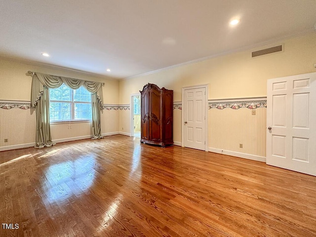 141 Country Club Dr, Henderson, NC 27536 - unfurnished room featuring wood finished floors, crown molding, and recessed lighting