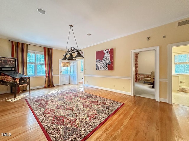 141 Country Club Dr, Henderson, NC 27536 - unfurnished dining area featuring plenty of natural light and light wood-style flooring