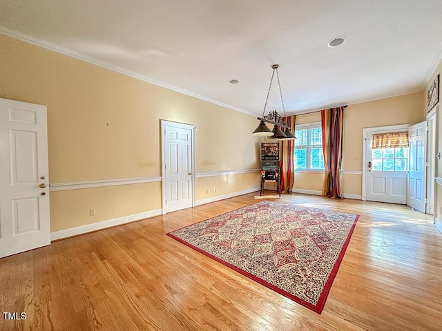 141 Country Club Dr, Henderson, NC 27536 - dining room featuring wood finished floors and crown molding